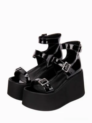 Black gothic lolita platform sandals pair view with patent PU upper, multi adjustable buckle straps on ankle and toe, thick chunky wedge sole, round toe profile, front double shoe perspective