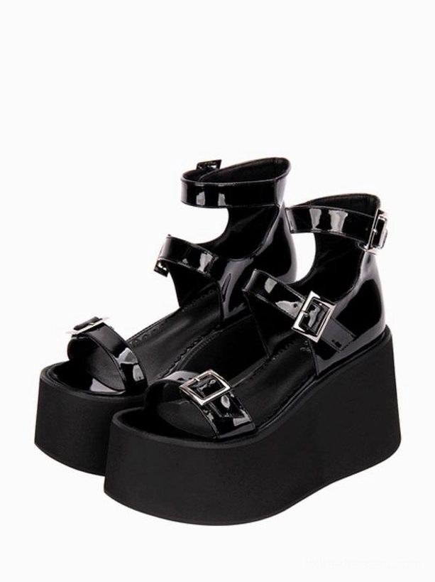 Black gothic lolita platform sandals pair view with patent PU upper, multi adjustable buckle straps on ankle and toe, thick chunky wedge sole, round toe profile, front double shoe perspective