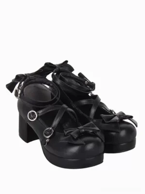 Black gothic lolita sandals rear three-quarter view displaying ankle strap with bow embellishment, silver hardware accents, pu leather material, and platform heel structure