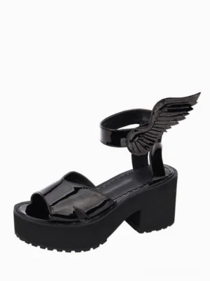 Black Gothic Lolita platform sandals left three-quarter view showcasing patent PU finish, peep toe cutout, winged ankle decoration, and chunky block wedge heel on white background