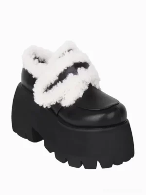 Single black gothic lolita platform shoe left side three-quarter view square rounded toe white fuzzy strap