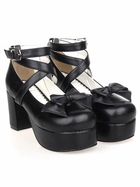 Black lolita platform shoes with glossy PU leather, buckle cross straps, and thick platform sole, angled front view pair