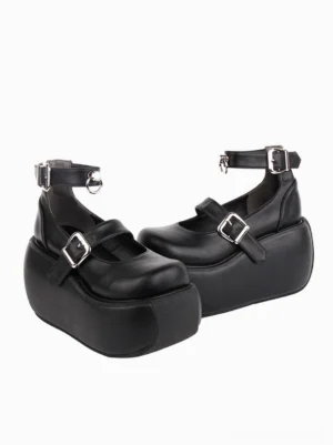 Side profile view of black Gothic Lolita platform shoes displaying square rounded toe shape silver buckled straps and chunky low platform sole