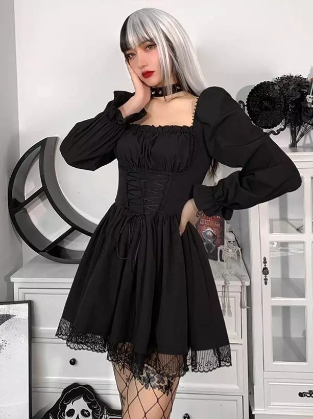 Black gothic lolita dress half-body front view with puff sleeves, fishnet stockings detail, lace ruffle hem - indoor vintage setting