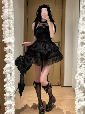 Black Gothic Lolita dress with tiered ruffled skirt and lace trim - knee-length front mirror selfie showcasing dress silhouette and layered tulle construction