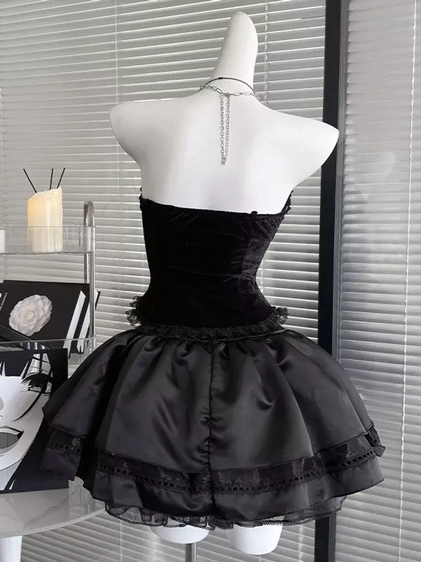 Black Gothic Lolita strapless corset dress back view displaying solid velvet bodice back neck chain decoration and layered satin skirt with lace trim details