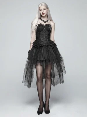 Black tiered tulle gothic lolita skirt front three-quarter angle showing ruffled waist trim and high-low tulle design, styled with black stockings and lace choker