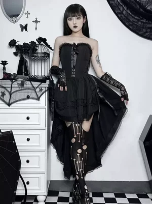 Black sleeveless gothic lolita dress with lace-trimmed neckline and ruffled high-low skirt, front full-body view worn by female model
