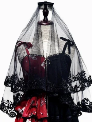 Black gothic lolita lace veil headdress front view on mannequin wearing red-black lolita dress with floral trim