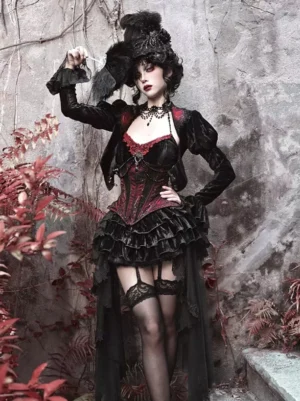 Black gothic lolita corset dress set with velvet boned vest and ruffled trumpet skirt full-body front view on model with feathered headdress