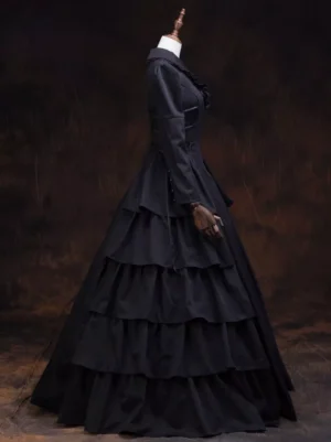 Black Gothic Lolita Victorian formal dress side profile view, fitted waist with multi-tiered ruffled skirt and buttoned sleeve cuffs on mannequin