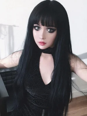 Black long straight Gothic Lolita wig with blunt bangs front view close-up showing smooth texture and pure black color on model with gothic makeup wearing black outfit