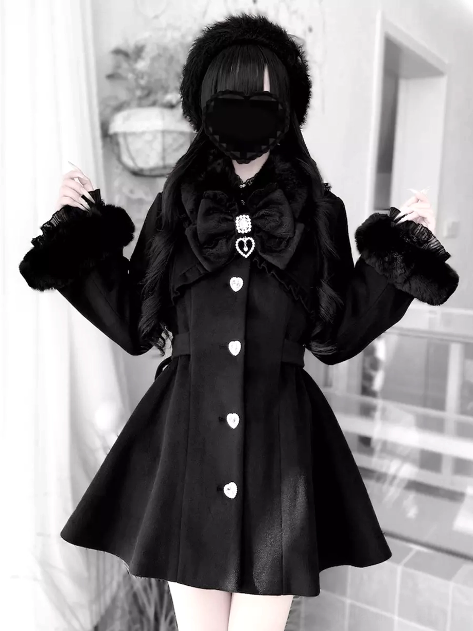 Black Gothic Lolita winter overcoat full front view with model, ruffled lace cuffs, fitted waist, heart-shaped buttons, and A-line hem