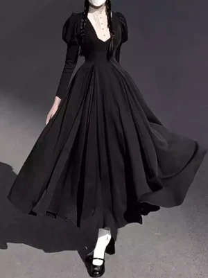 Black gothic nun lolita dress with lace-up front closure and white trim neckline, featuring voluminous puffed long sleeves and full swing skirt in classic gothic lolita style