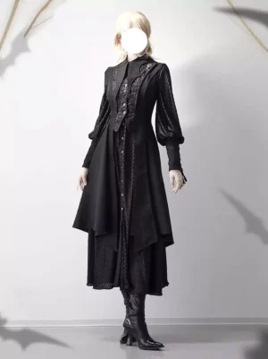 Full body black gothic ouji lolita outfit worn by model with long sleeves puffed fit and asymmetrical hemline