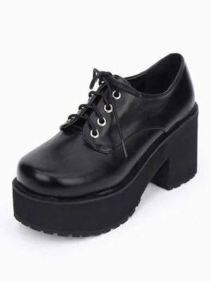 Black gothic platform chunky heel lace-up Lolita boots left three-quarter view showing glossy leather upper and metal lace eyelets