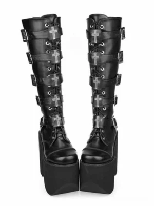 Black gothic platform knee-high boots with silver cross buckles and decorative hardware, paired front view showing round toe lace-up design