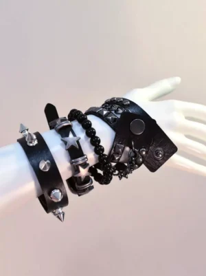 Multi-strap gothic punk leather bracelet with snap fasteners and metal accents displayed on mannequin hand front-side view
