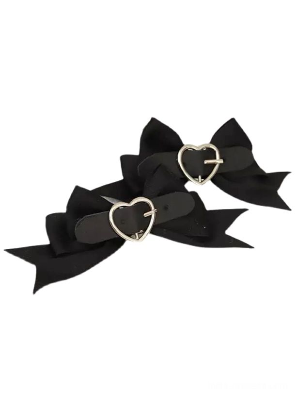 Black matte bow hair clips with silver heart-shaped chain buckles on white background flat lay view sweet lolita accessories