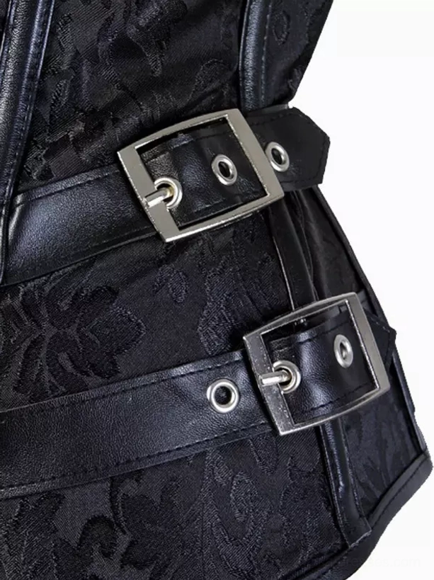 Close-up detail of black embossed jacquard floral fabric with silver leather buckles corset hardware