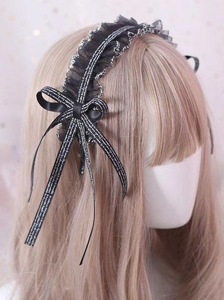 Black lace lolita headdress with silver-trimmed ruffles and black striped ribbon bow shown from rear view on mannequin head displaying elegant design