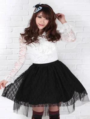 Black lace ruffle lolita skirt front three-quarter view, sweet lolita aesthetic, sheer lace overlay, layered ruffles, white lace blouse styling