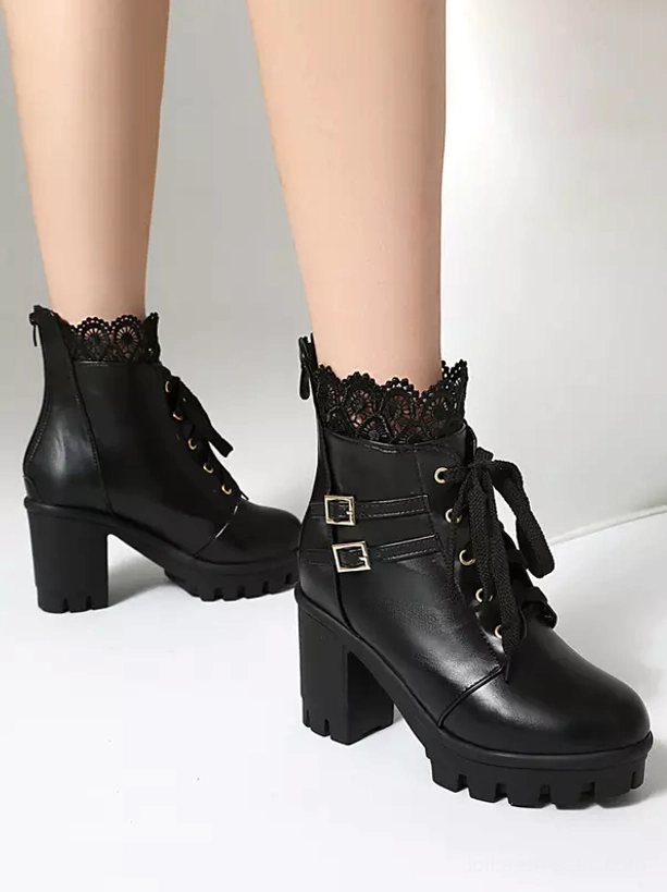 Black Sweet Lolita ankle boots close-up front double-shoe view showing round toe metal buckles and lace-up front details