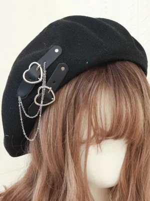 black lolita beret with heart chain accessory front three quarter view on mannequin with light brown wavy hair