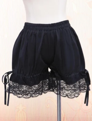 Black lolita bloomers with lace trim and ribbon bows shown from rear view on dress form, displaying elastic waist and scalloped lace hem details