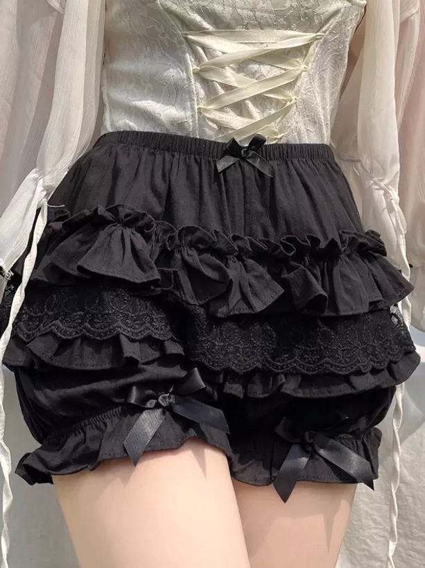 Black ruffled lolita shorts side view front waist satin bow layered ruffles garden corset cardigan set