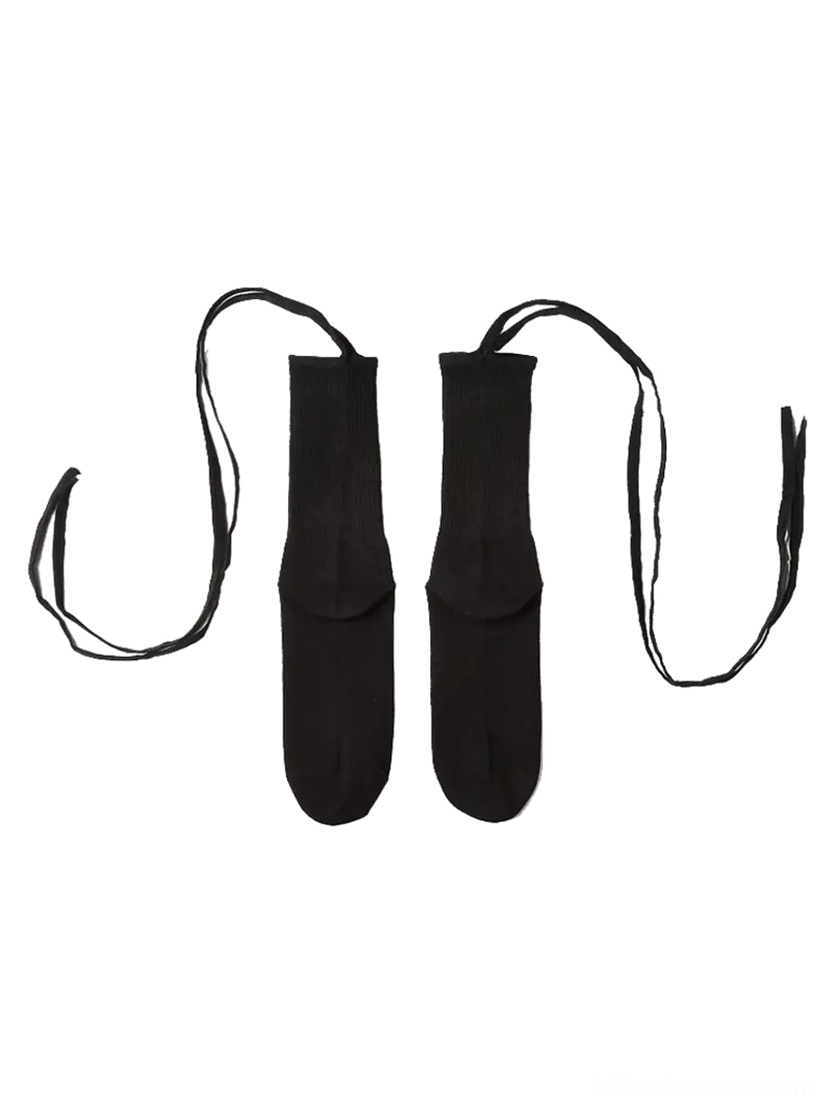 Flat lay top-down view of black knitted Lolita calf socks with detachable lace wrapping straps, showing full pair and adjustable strap design