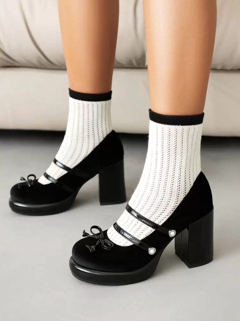 Black Lolita chunky heel Mary Jane pumps double feet side view with dual ankle straps front bow smooth leather finish