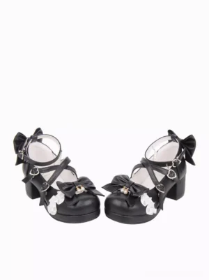 Side view of black Lolita high heel shoes showing ankle cross straps with decorative bows and chunky heel block structure