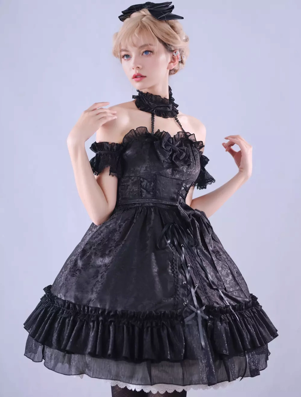 Black Gothic Lolita dress full front medium shot with off-shoulder ruffled trim and jacquard woven fabric, layered ruffled skirt with choker accessory