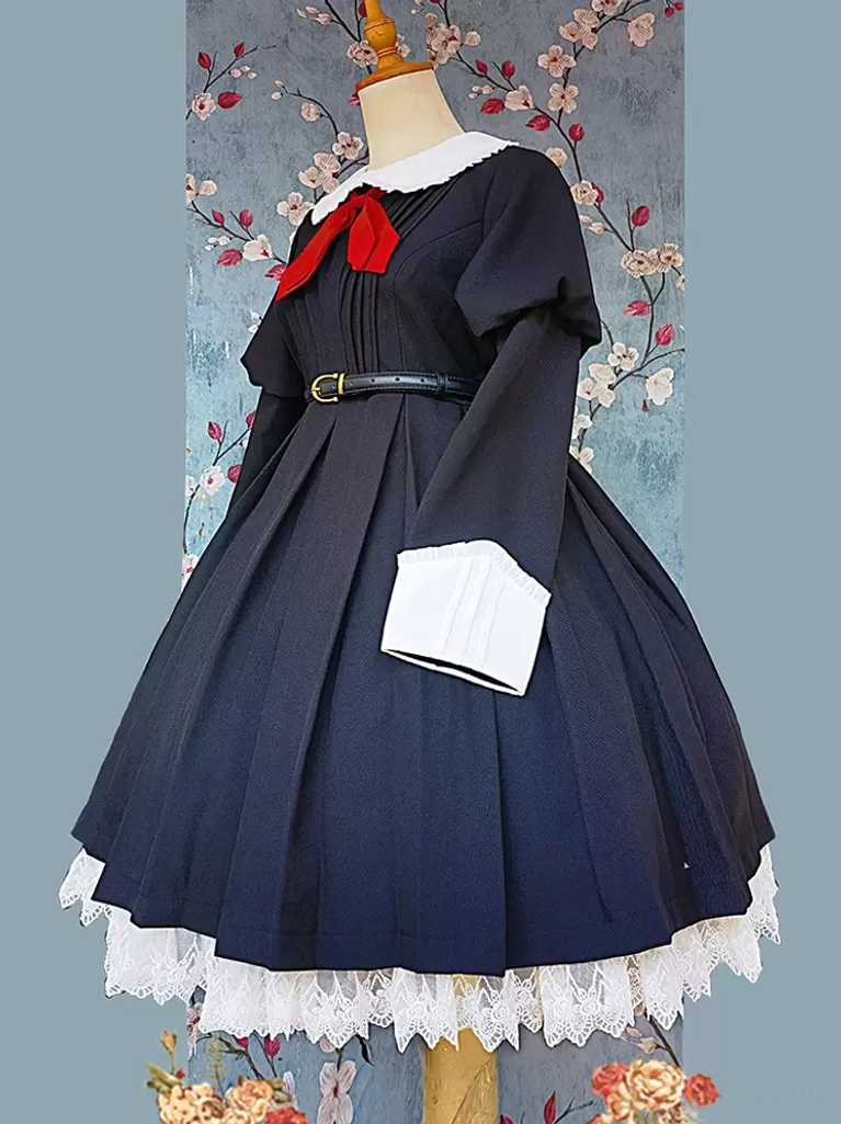 Right three-quarter view of classic black lolita dress showing puffed sleeves with white cuffs, full voluminous pleated skirt, and authentic silhouette on dress form