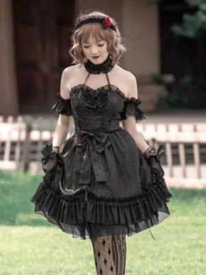 Gothic Lolita black dress with off-shoulder ruffled cuffs and layered ruffled skirt, front bow decoration detail, outdoor lawn setting