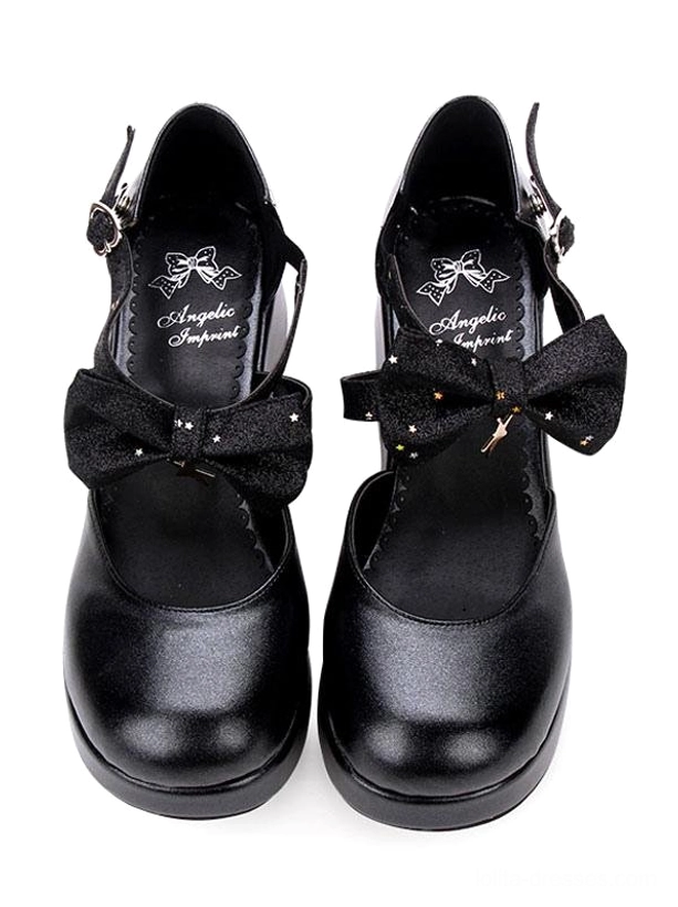 Black Lolita flatform shoes front direct view showing adjustable ankle strap wedge heel platform structure