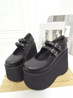 Black Mary Jane lolita platform shoes with dual adjustable buckle straps and thick wedge sole, overhead oblique view showcasing round toe and platform construction