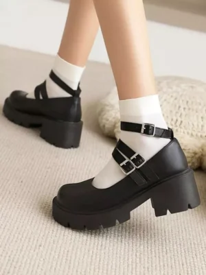 Black Mary Jane lolita platform shoes side profile showing adjustable ankle buckle straps and chunky heel block design