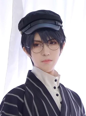 Black lolita newsboy cap side-front three-quarter angle showing leather brim strap hardware on male cosplayer wearing striped Ouji wear and glasses