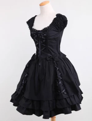 Gothic lolita dress three-quarter front angle showing rounded square neckline corset-style waist and layered skirt silhouette