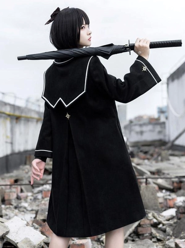 Black lolita overcoat back view showing special collar design star embroidery knee-length cut academic style polyester long coat for tea parties