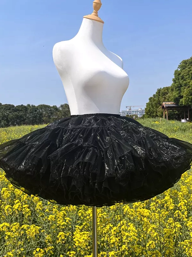 Black lolita petticoat fitted waistband with tiered ruffled design side view demonstrating structured volume and layer construction