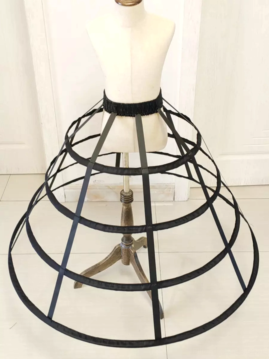 Black 4-layer lolita cage bustle petticoat with rigid boning hoops creating dramatic bell-shaped silhouette, front view
