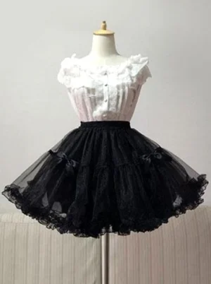 Black lolita petticoat layered tulle crinoline with lace ruffles hem paired with white blouse front view dress form