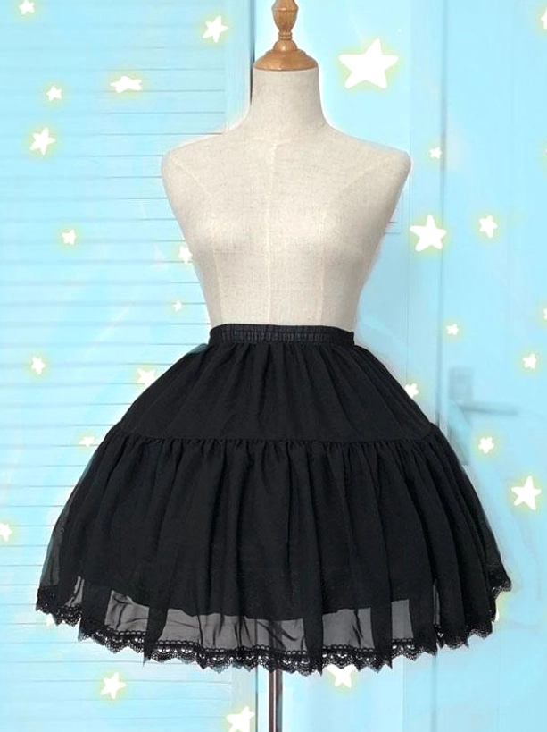Black lolita petticoat with tiered lace ruffles front view on dress form showcasing boned structure and volume against light blue background with star decorations