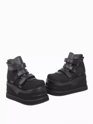 Black Lolita platform ankle boots side three-quarter angle displaying high-top ankle cut, dual velcro straps, and layered thick platform sole construction