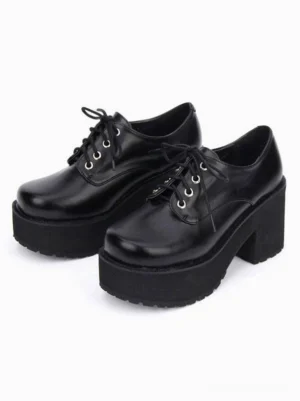 Pair of black platform lace-up Lolita shoes front view displaying round toe shape and substantial chunky sole