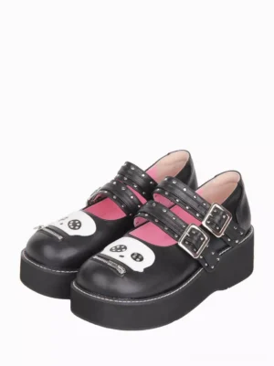 Black Gothic Lolita platform Mary Jane shoes front three-quarter view with pink skull zipper print inner lining and riveted buckle straps