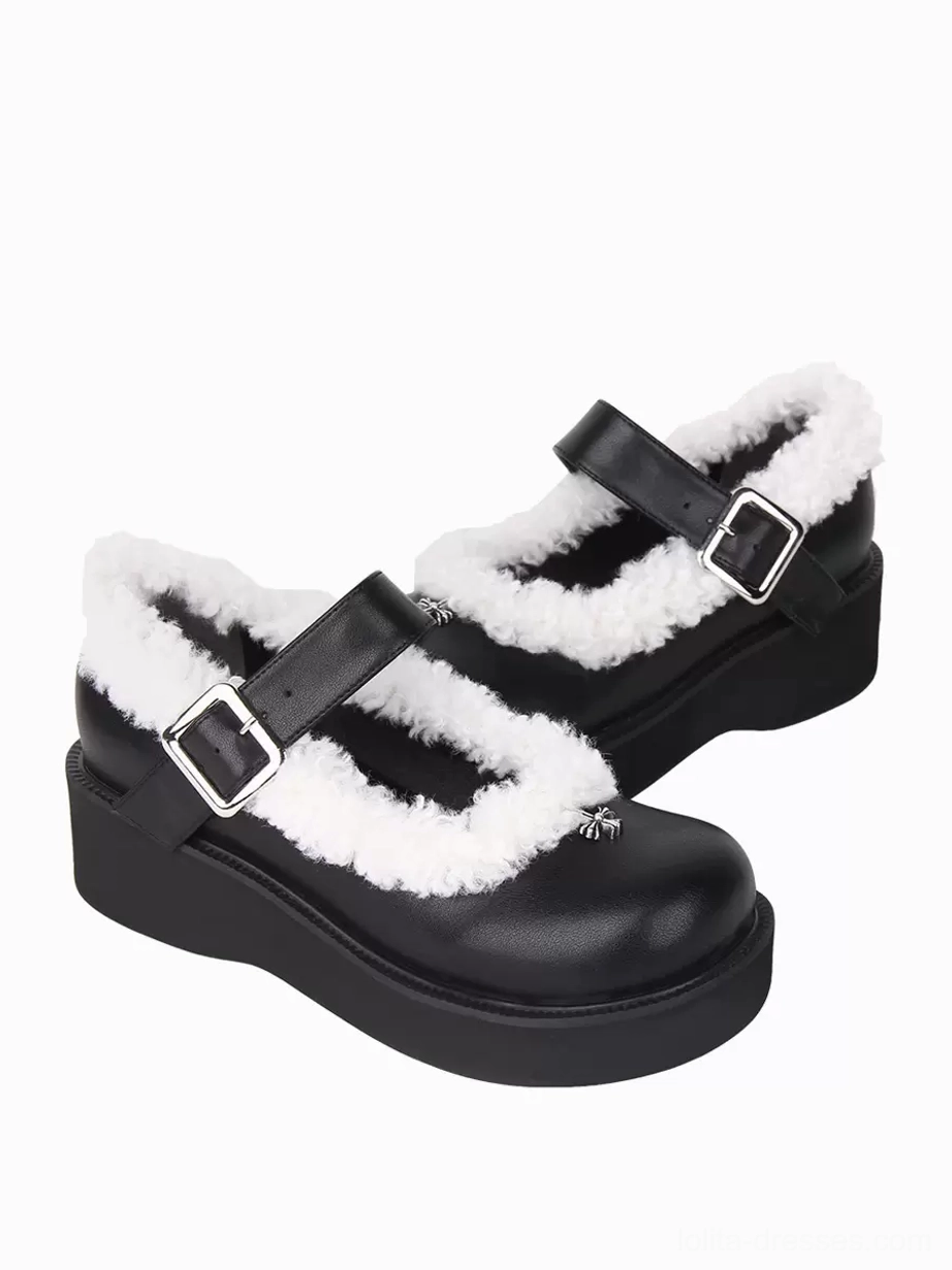 Black Mary Jane Lolita platform pumps low front side angle showing left strap buckle and delicate silver toe decoration accent